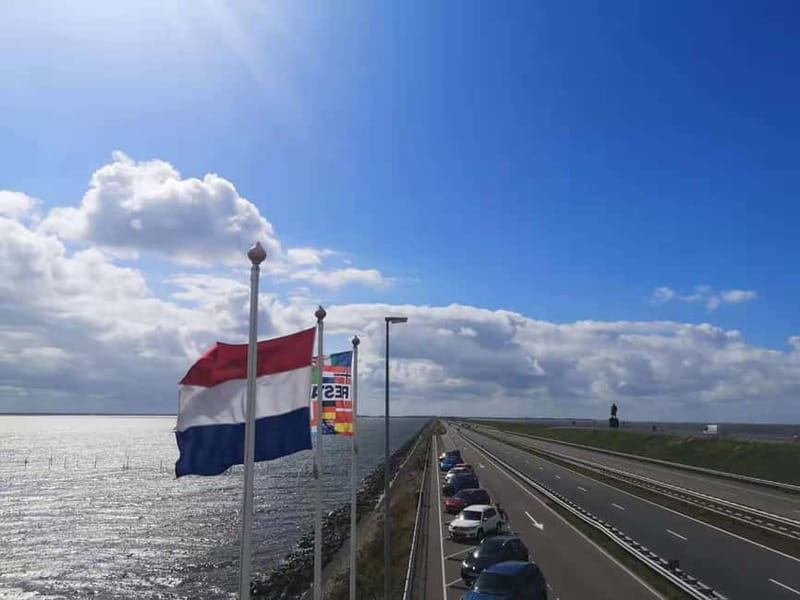 Amsterdam: Giethoorn, Afsluitdijk and Zaanse Schans Day Trip - Giethoorn by boat: the most peaceful part of the day