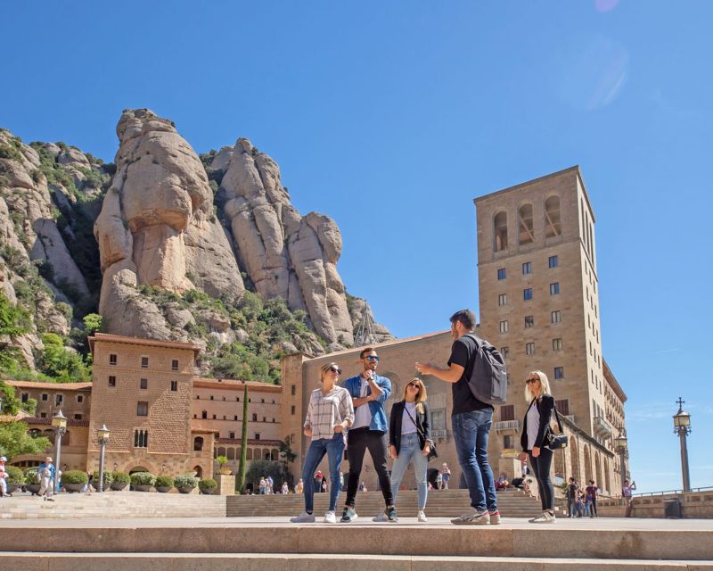 Barcelona: Montserrat, Girona & Costa Brava Guided Day Trip - Montserrat: rock needles, monastery, and the Black Madonna