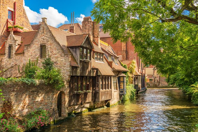 Bruges and Ghent Day Trip from Brussels - Bruges through squares, bridges, and medieval trades