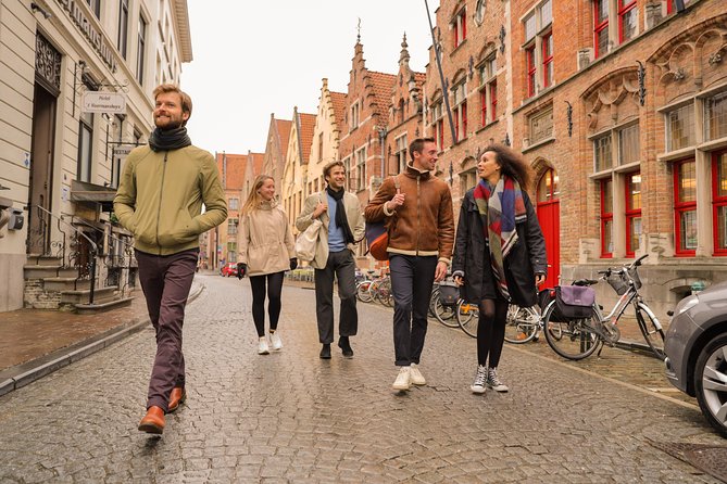 Bruges Guided or Audio Trip with Canal Cruise Option from Paris - Entering Bruges through the medieval center