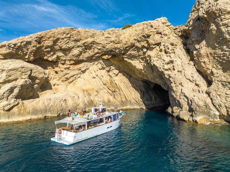 Cala Rajada: Boat Excursion with Drinks and Food - A social trip, not a private sailing