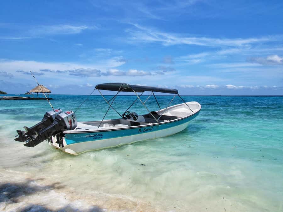Cartagena: Rosario Island and Mangroves Private Day Trip - A quiet beach stop with a welcome drink