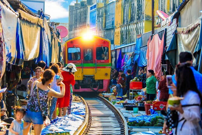 Day Trip to Bangkok Floating Market & Maeklong Railway - What the guide adds to a group tour