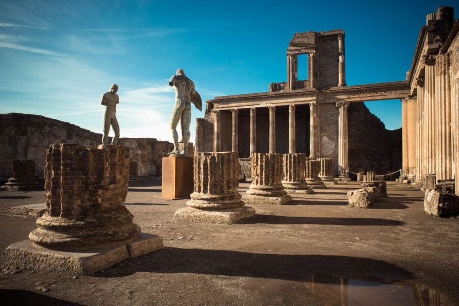 Day Trip to Pompeii & Vesuvius from Naples - Entering Pompeii with an archaeologist
