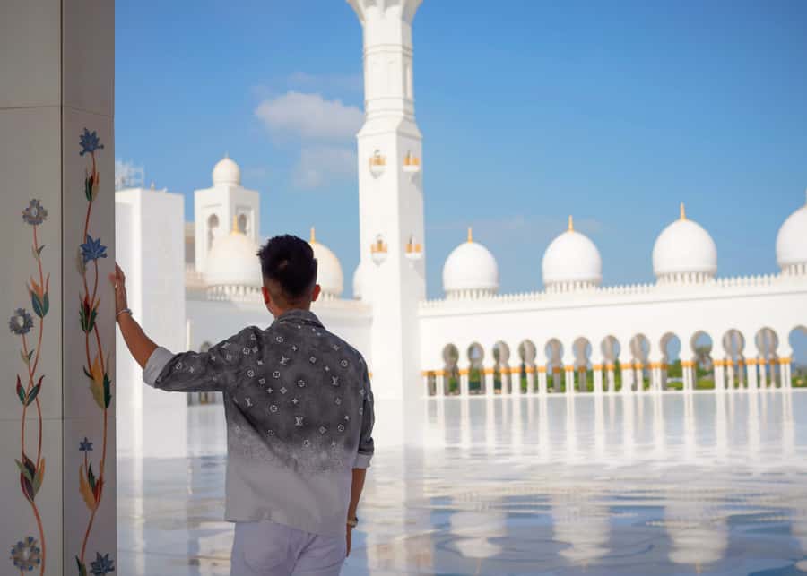 Dubai: Abu Dhabi Day-Trip Grand Mosque, Royal Palace & Lunch - Abu Dhabi’s Corniche and Emirates Palace from the coach