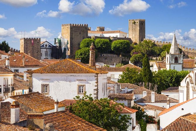 Fátima, Nazaré and Óbidos Small-Group Day Trip from Lisbon - Batalha Monastery: Gothic stone in a tight 40 minutes
