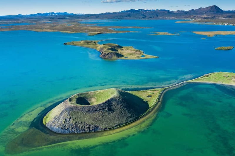 From Akureyri Port: Diamond Circle Guided Day Trip w/ Lunch - Húsavík adds a human scale to the route
