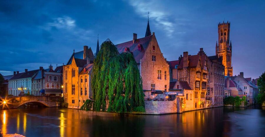 From Amsterdam: Bruges Day Trip in English with Boat Option - Canals, brick towers, and the city’s medieval center