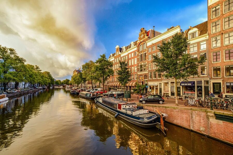 From Brussels: Cheese, Clogs & Windmills Amsterdam Day Trip - Amsterdam in three and a half hours