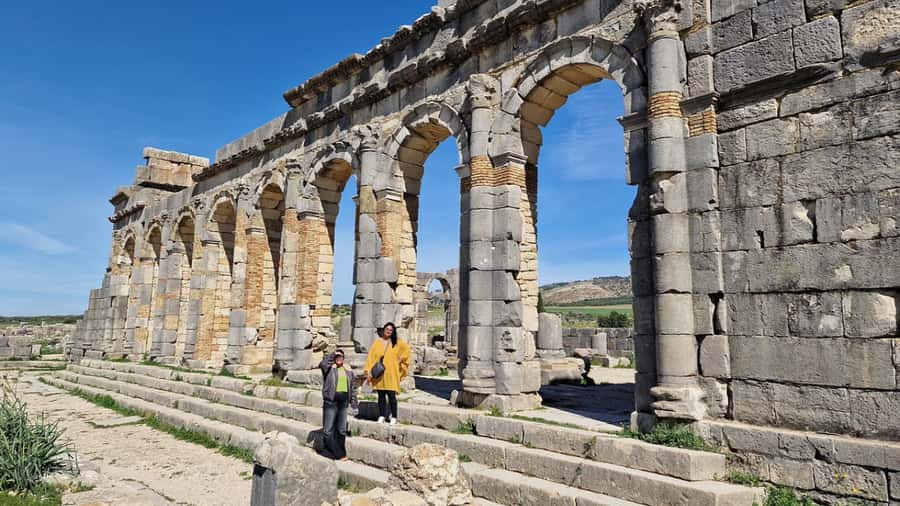 From Fes: Meknes Volubilis and Moulay Idriss Day Trip - Walking through Roman Volubilis