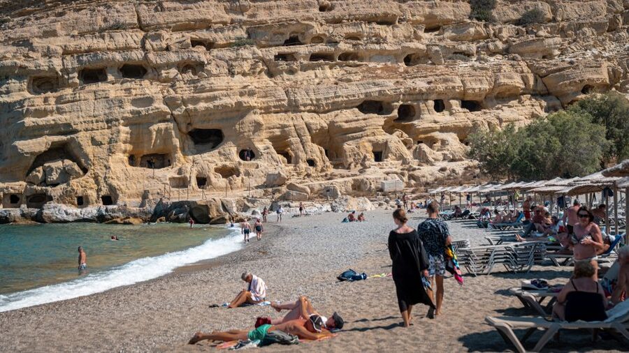 From Heraklion: Day Trip to Matala Hippie Beach and Caves - Climbing into the former Roman tombs