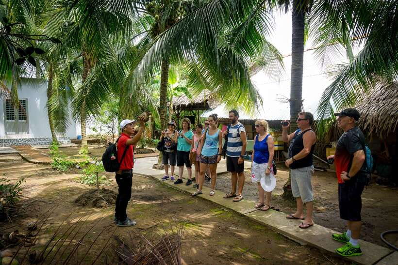 From Ho Chi Minh: Mekong Delta Small Group Day Trip - Coconut candy, fruit, honey tea, and folk music