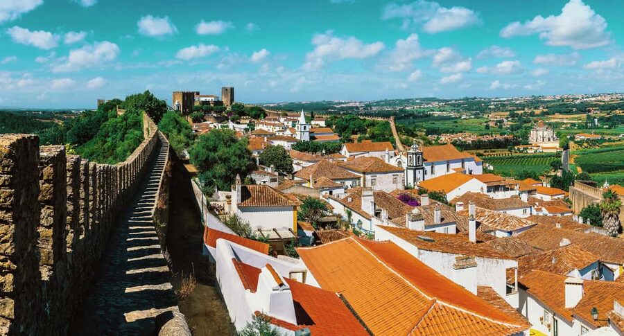 From Lisbon: Nazare Big Waves and Óbidos Guide Day Trip - Nazaré from the cliffs and the beach