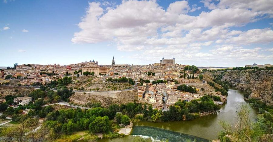 From Madrid: Toledo and Segovia Guided Day Trip - Meeting in Madrid and settling into the bus