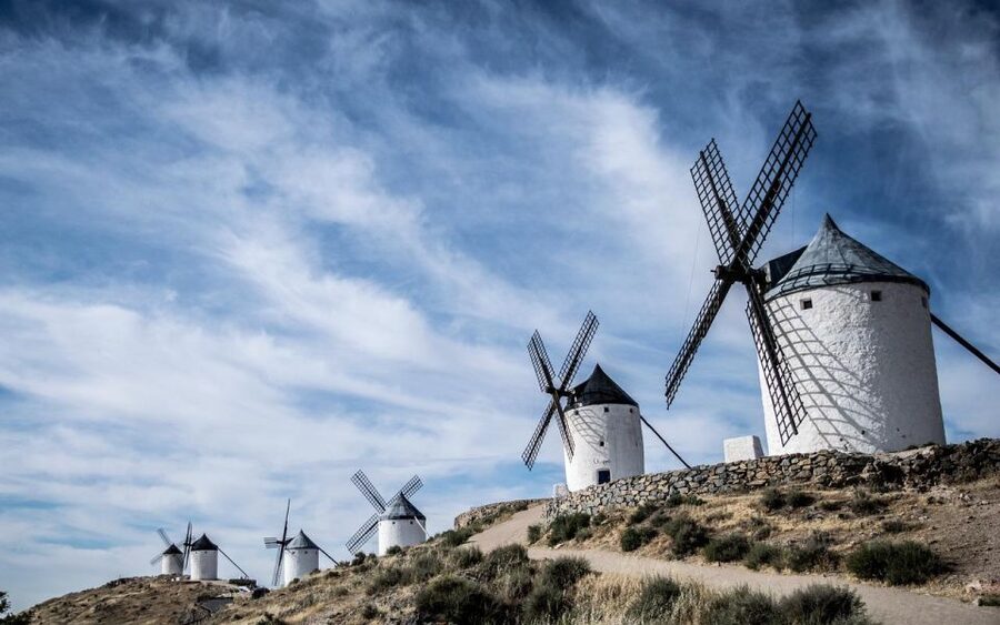 From Madrid: Toledo, Windmills & Alcala de Henares Day Trip - Consuegra and the windmills on the ridge