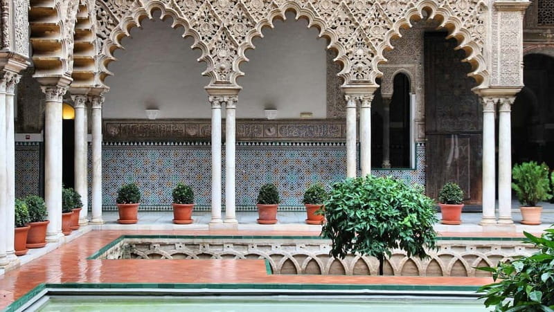 From Malaga: Seville Day Trip with Real Alcázar Tickets - What the guides add