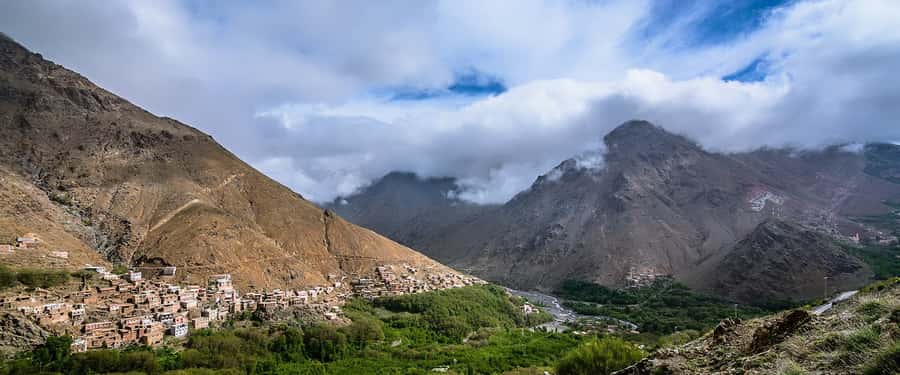 From Marrakech: Atlas Mountains and Berber Village Day Trip - Lunch with a Berber family or mountain restaurant