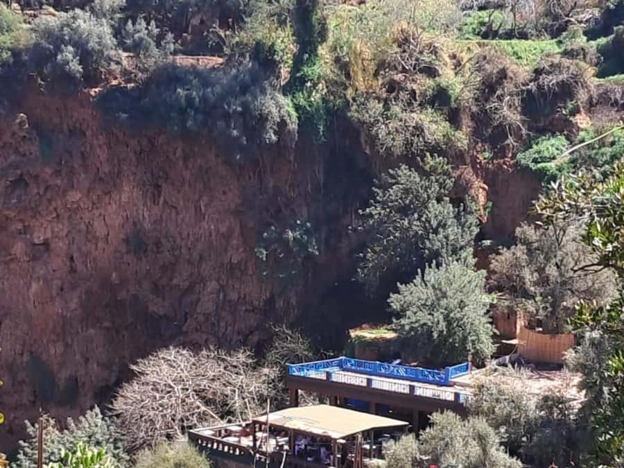 From Marrakech:Ouzoud Waterfalls Day Trip with Boat Tour - The boat ride under the falling water