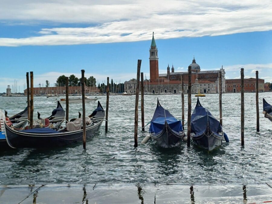From Milan: Venice City Highlights Guided Day Trip - Arriving in Venice by boat