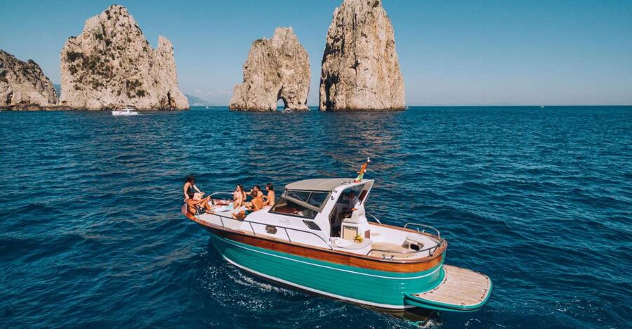 From Naples: Capri Boat Day Trip with Drinks - Capri from the water: caves, cliffs, and famous rock formations