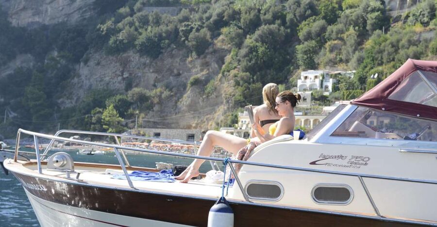 From Positano: Sorrento Coast & Capri Full-Day Trip by Boat - The caves and cliffs between Sorrento and Capri