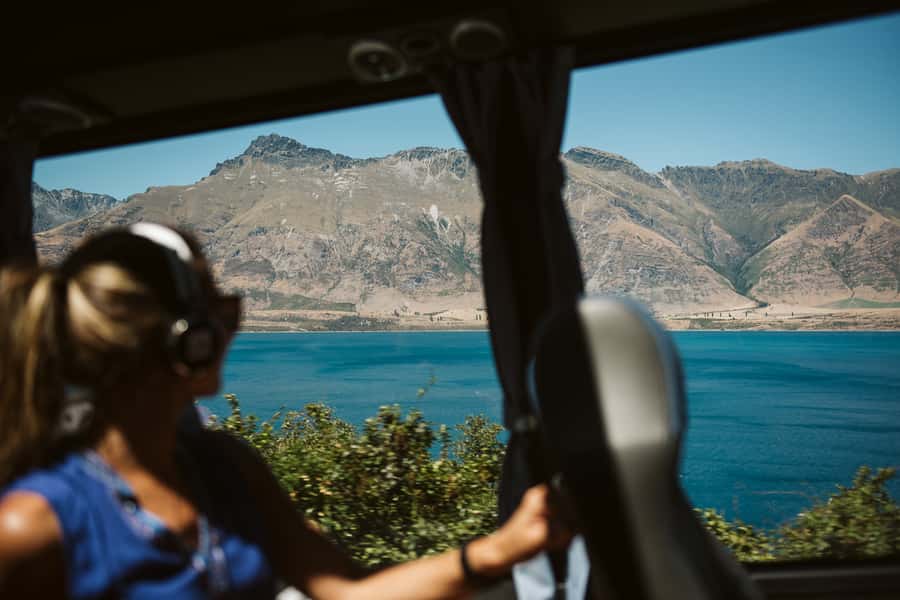 From Queenstown: Half Day Trip to Glenorchy by Coach - Stories, humor, and helpful guiding on the coach