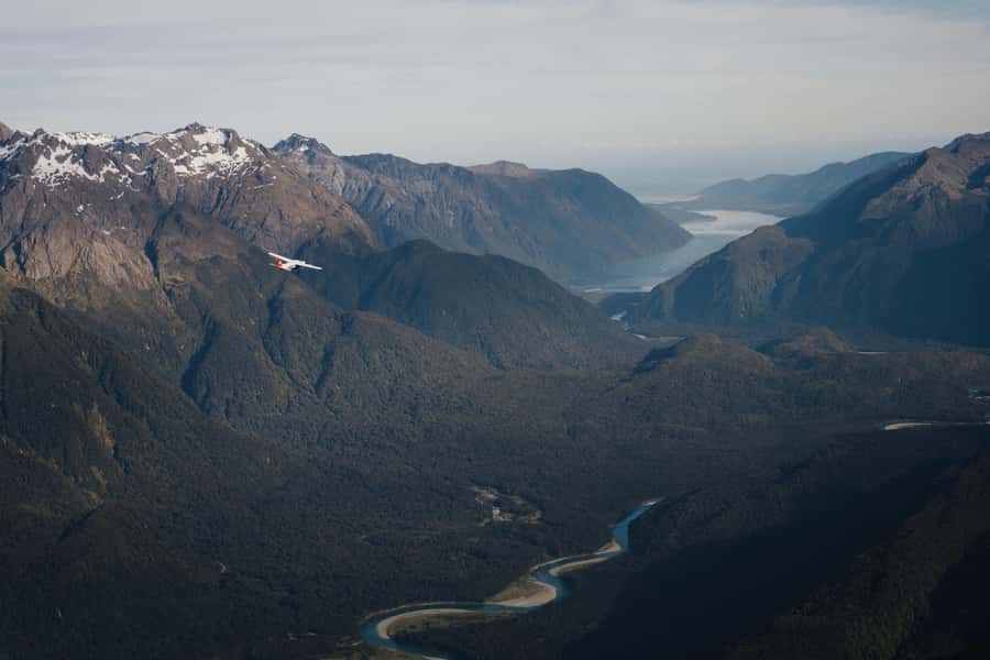 From Queenstown: Milford Sound Full-Day Trip by Plane & Boat - Two hours beneath Mitre Peak and the waterfalls