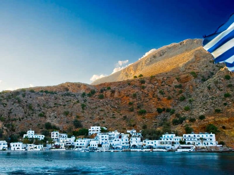 From Rethymno/Chania: Loutro Day Trip by Boat - First look at Loutro’s white houses and calm water