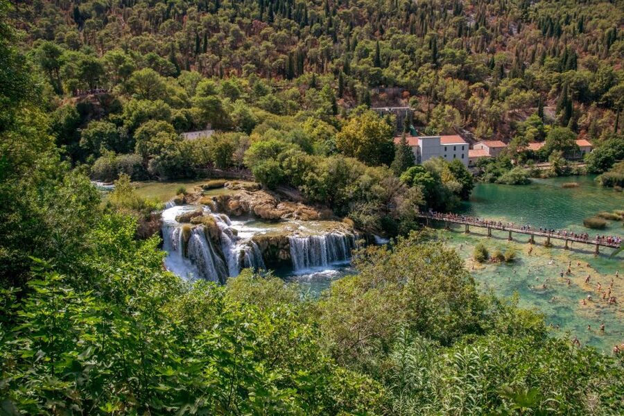 From Zadar: Krka National Park and Waterfalls Day Trip - Entering Krka National Park and walking to Skradinski Buk