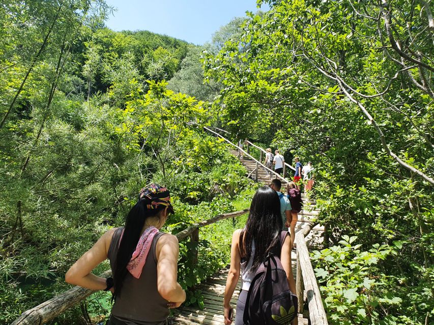From Zagreb: Plitvice & Rastoke Guided Day Trip with Ticket - The boat and panoramic train add welcome variety