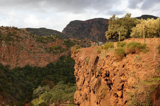 Full Day Trip To Ouzoud Waterfalls From Marrakech & Boat Tour - First views from the top of the 110-meter falls