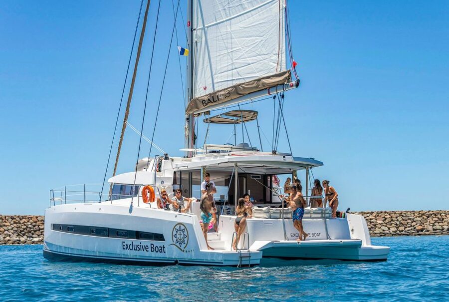 Gran Canaria: Catamaran Day Trip with Food and Drinks - First stop: swimming, snorkeling, and SUP time