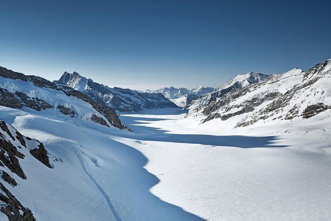 Jungfraujoch: Top of Europe Day Trip from Zurich - Lauterbrunnen begins the mountain railway journey