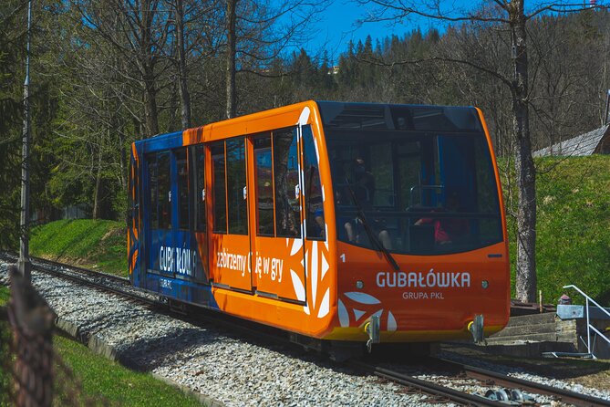Krakow to Zakopane: Funicular, Tasting and Thermal Baths Day Trip - Oscypek and vodka at a Witów shepherd’s hut