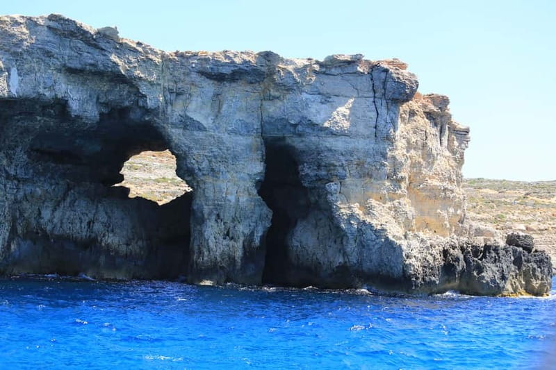 Malta: Comino, Blue Lagoon, + Sea Caves Day Trip - Blue Lagoon: beautiful water and a busy shoreline