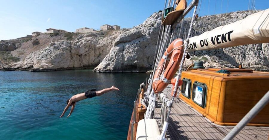 Marseille: Calanques Sailing Day Trip with Lunch and Wine - Swimming and snorkeling from the yacht