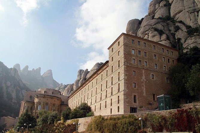 Montserrat Day Trip Private or Small Group with Basilica Tickets - The Benedictine monastery and its striking setting