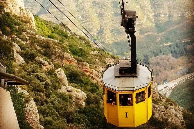 Montserrat Day Trip Private or Small Group with Basilica Tickets - Entering the basilica to see La Moreneta