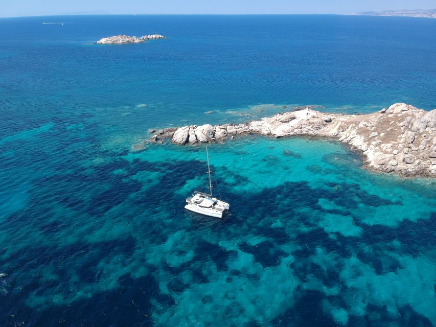 Naxos: Luxury Catamaran Day Trip with Lunch and Drinks - What makes the secluded stops worthwhile