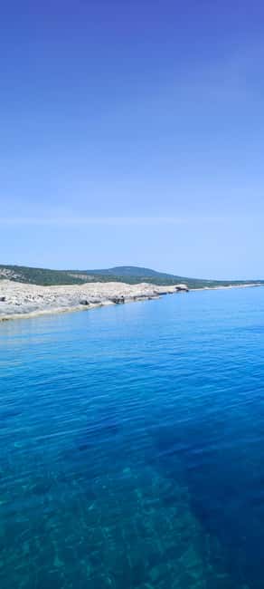Pafos,Blue Lagoon,Latchi,day trip, coach boat+waterslide. - Swimming in the Blue Lagoon