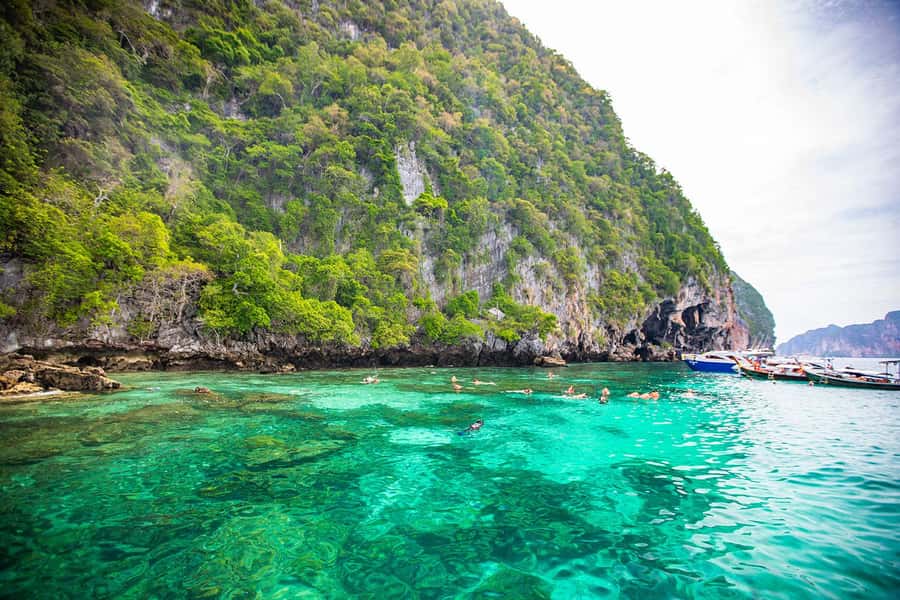 Phuket: Maya Bay, Phi Phi, Green, and Khai Islands Day Trip - Green Island starts the water activities