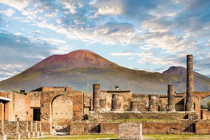 Pompeii and Mount Vesuvius Day Trip from Rome with Pizza Lunch - Pompeii: ancient streets under Mount Vesuvius