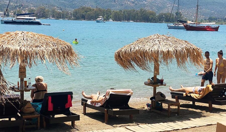 Poros Island: Full Day Trip From Athens with Swimming - Poros Town, stories, and harbor views