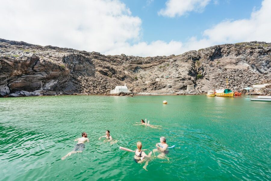 Santorini: Luxury Catamaran Day Trip with Meal and Open Bar - Greek food, local drinks, and an easygoing boat rhythm