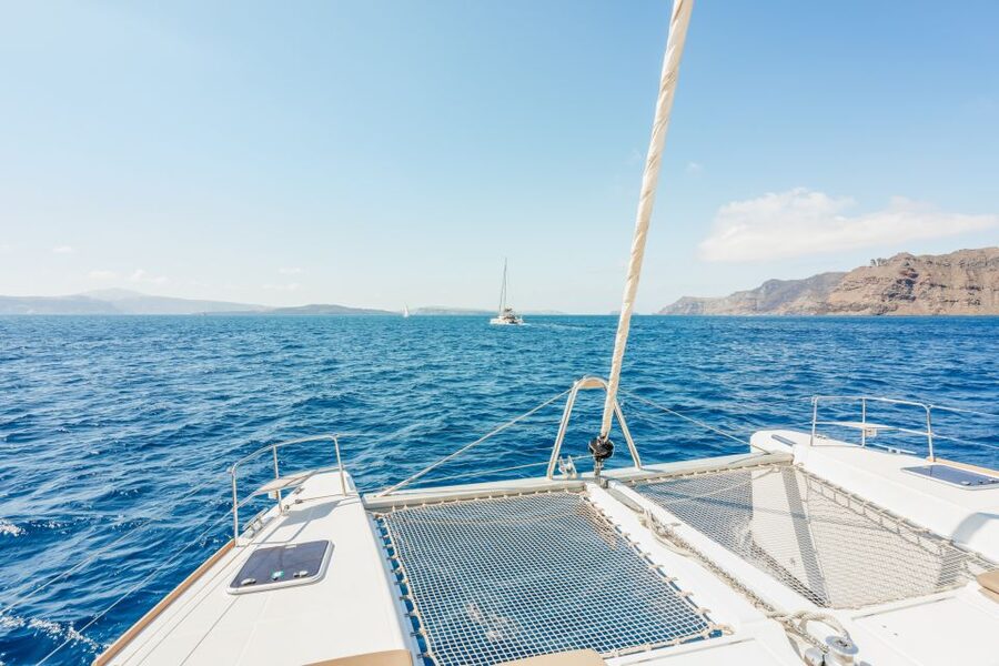 Santorini: Luxury Catamaran Day Trip with Meal and Open Bar - Red Beach and White Beach from the water