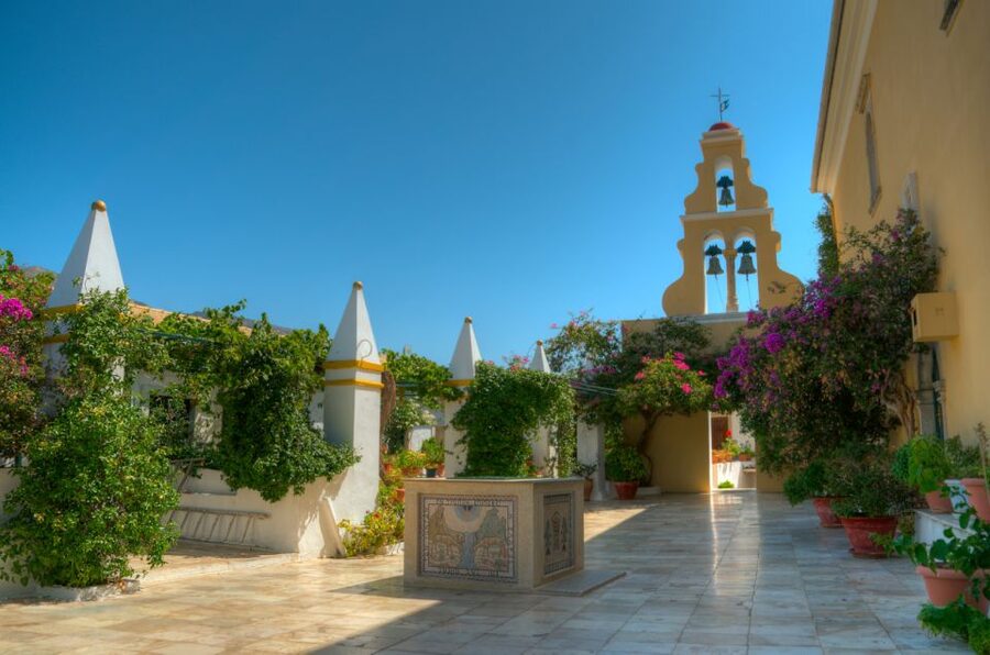 Saranda: Corfu Town and Palaiokastritsa Day Trip with Cruise - The road west to Palaiokastritsa