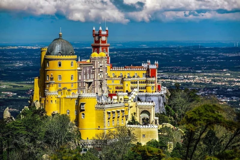 Sintra Magic & Coastal Wonders: Private Day Trip from Lisbon - Pena Palace brings color and royal drama