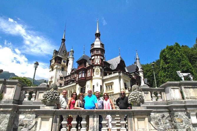 Small-Group Day Trip to Dracula's Castle, Brasov and Peles Castle - Bran Castle: atmosphere, stairs, and Dracula marketing