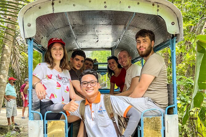 Small-Group Mekong Delta Day Trip: Boat Ride, Cottages & Pagoda - Vinh Trang Pagoda and its giant Buddhas