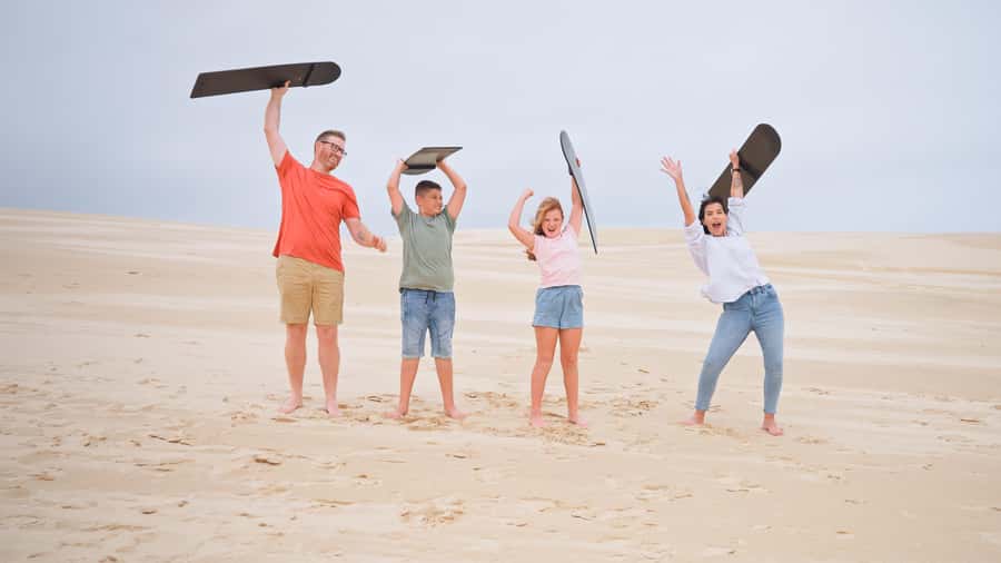 Sydney: Port Stephens Dolphin Cruise & Sandboarding Day Trip - Dolphins on a 90-minute Port Stephens cruise